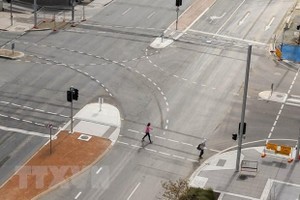 Cảnh vắng vẻ trên đường phố ở Canberra, Australia, ngày 21/8/2021. (Ảnh: THX/TTXVN).