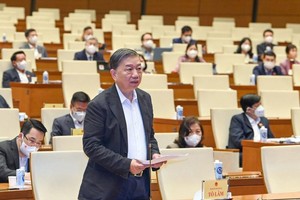 Bộ trưởng Bộ Công an Tô Lâm giải trình tại phiên chất vấn.