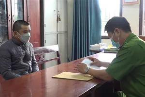 Đối tượng Nguyễn Văn Mạnh tại cơ quan công an. (Ảnh: Bộ Công an).