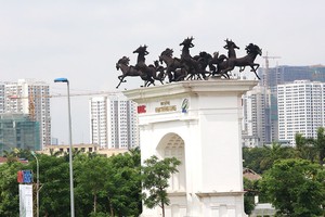 Bóng dáng của các đầu tư nước ngoài xuất hiện ngày càng nhiều tại các dự án 
bất động sản Việt Nam. Ảnh: Dũng Minh