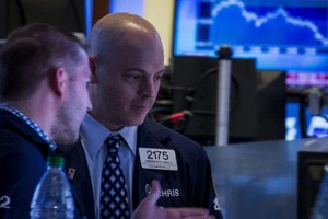 Phố Wall phục hồi nhờ kết quả kinh doanh khả quan - Ảnh: Reuters