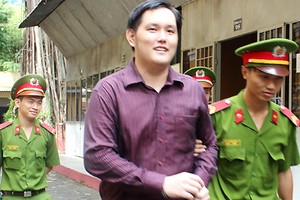 Trung sau phiên tòa. Ảnh: Vnexpress