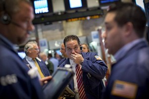 Đà tăng của phố Wall đã có dấu hiệu chững lại - Ảnh: Reuters