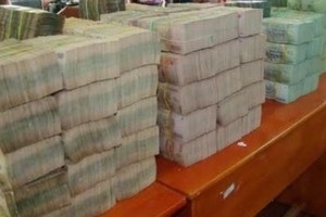 Số tang vật vụ buôn lậu tiền bị cơ quan công an thu giữ (Ảnh: Vietnamnet)