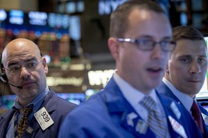 Phố Wall kết thúc chuỗi 5 phiên lập đỉnh cao lịch sử liên tiếp trong phiên thứ Tư (12/11) - Ảnh: Reuters