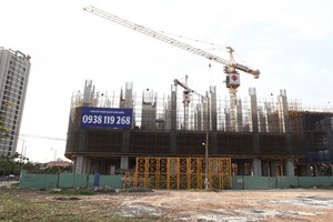 Về lâu dài, bất động sản sẽ sinh lời tốt nhưng hiện nay sự phục hồi chưa thực sự rõ nét - Ảnh: Lê Toàn