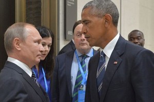 Tổng thống Nga Putin và Tổng thống Mỹ Obama gặp nhau tại G20 hồi tháng 9. Ảnh: AP