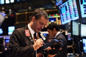 Giới đầu tư phố Wall có 1 năm thành công (Ảnh minh họa: AFP)