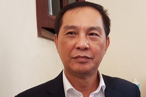 Giám đốc Sở Quy hoạch Kiến trúc Hà Nội Lê Vinh trao đổi với báo chí sáng 5/1. Ảnh: Võ Hải.