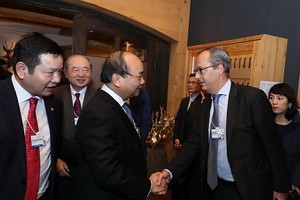 Thủ tướng gặp cáctập đoàn thành viên WEF trong lĩnh vực công nghệ thông tin. Ảnh: VGP