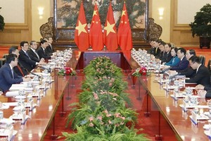 Chủ tịch nước Trần Đại Quang hội đàm với Tổng Bí thư, Chủ tịch Trung Quốc Tập Cận Bình. (Ảnh: Nhan Sáng/TTXVN)