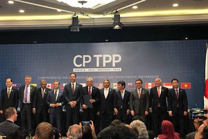 Đại diện 11 nước thành viên ký CPTPP tại Chile vào tháng 3/2018.Ảnh: Reuters
