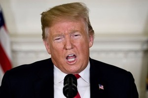 Trump phát biểu tại Nhà Trắng ngày 19/1. Ảnh: AFP.