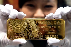 Nhà đầu tư Trung Quốc đang mạnh tay mua vàng, khiến giá không ngừng tăng. Ảnh: AFP