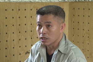 Đối tượng Tú khi bị bắt. Ảnh Công an nhân dân.