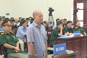 Đinh Ngọc Hệ tại phiên tòa năm 2018.