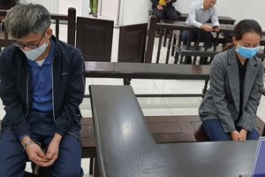 Bị cáo Tuấn và Trinh tại tòa.