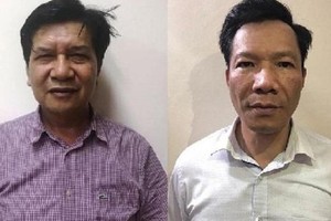 Các bị can Trần Ngọc Hà (trái) và Vũ Quang Tâm.