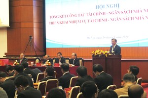 Bộ trưởng Bộ Tài chính Đinh Tiến Dũng phát biểu tại Hội nghị sáng nay