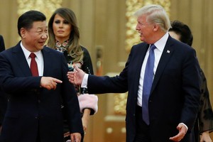 Chủ tịch Trung Quốc Tập Cận Bình và Tổng thống Mỹ Donald Trump. Ảnh: Reuters.