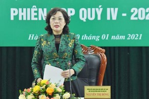 Thống đốc NHNN Việt Nam kiêm Chủ tịch HĐQT NHCSXH Nguyễn Thị Hồng phát biểu tại phiên họp.