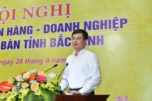 Ông Phạm Thanh Hà, Phó thống đốc Ngân hàng Nhà nước Việt Nam phát biểu tại Hội nghị