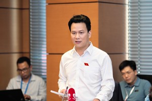 Bộ trưởng Bộ Tài nguyên và Môi trường Đặng Quốc Khánh phát biểu tại tổ sáng 9/6 về dự thảo Luật Đất đai (sửa đổi) - Ảnh: M.Minh