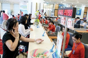 Ý thức trả nợ của khách hàng đã cải thiện đáng kể sau khi Điều 7, Nghị quyết số 42/2017/QH14 cho phép tổ chức tín dụng thu giữ tài sản đảm bảo. Ảnh: Đ.T