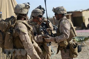 Binh sỹ Mỹ tuần tra tại khu vực Sangin, Afghanistan, ngày 12/6/2012. (Ảnh: AFP/TTXVN)