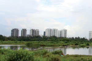 Dự án Phước Kiển nhiều năm vẫn là bãi đất trống. Ảnh: Việt Dũng