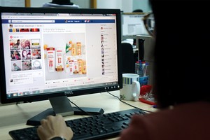 Việc quản lý, thu thuế đối với hoạt động kinh doanh thương mại điện tử gặp nhiều khó khăn thời gian qua. Ảnh: Dũng Minh