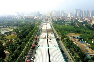 Đất vùng ven vẫn được xem là tâm điểm thị trường bất động sản năm 2021. Ảnh: Dũng Minh