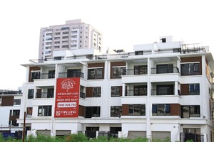 Chủ đầu tư phải gánh nhiều loại thuế, phí nên giá nhà khó giảm. Ảnh: Thành Nguyễn