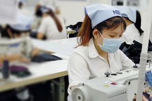 Doanh nghiệp dệt may có hàng hóa nhập khẩu để sản xuất xuất khẩu đưa đi gia công lại sẽ đươc miễn thuế.