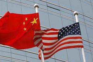 Lựa chọn hệ thống viễn thông của các nước đang phát triển sẽ tác động đến quỹ đạo phát triển của các nhà cung cấp mạng lớn nhất thế giới và có thể biến thập niên tới trở thành thập niên quyết định của cuộc chiến công nghệ Mỹ - Trung. Ảnh tư liệu: AFP