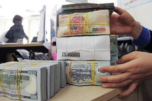 Khả năng ngân hàng giảm đồng loạt lãi suất cho vay là rất khó xảy ra. 