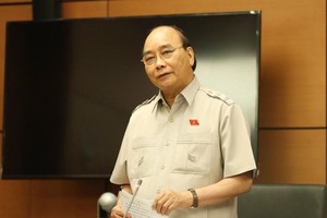 Chủ tịch nước Nguyễn Xuân Phúc tại phiên họp tổ chiều 22/7.