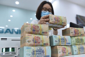 Đà tăng trưởng lợi nhuận của ngành ngân hàng dự kiến chậm lại trong 2 quý cuối năm 2021. Ảnh: Dũng Minh