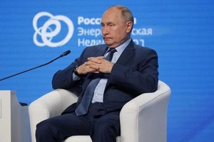 Tổng thống Nga Vladimir Putin tham dự phiên thảo luận tại diễn đàn quốc tế Tuần lễ Năng lượng Nga tổ chức vào ngày 13/10 tại Moscow. Ảnh: AFP