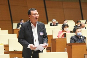 Tổng Thanh tra Chính phủ Đoàn Hồng Phong giải trình ý kiến đại biểu.