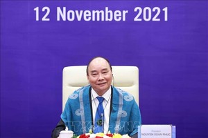 Chủ tịch nước Nguyễn Xuân Phúc tham dự hội nghị các nhà lãnh đạo kinh tế APEC lần thứ 28 được tổ chức theo hình thức trực tuyến. (Ảnh: TTXVN)