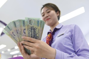 Thưởng Tết Nguyên đán 2022 ngành ngân hàng khả năng sẽ không cao như mọi năm. Ảnh: Dũng Minh