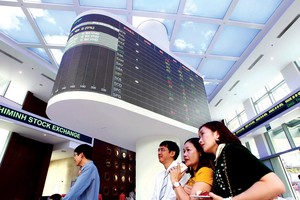 Việc huy động vốn qua sàn chứng khoán sẽ hiệu quả khi doanh nghiệp chuẩn bị tốt . Ảnh: Dũng Minh