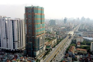 Tiềm năng rộng mở của thị trường bất động sản thu hút nhiều doanh nghiệp ngoài ngành. Ảnh: Dũng Minh