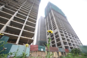 Tình trạng chủ đầu tư bàn giao nhà chậm trễ diễn ra khá phổ biến. Ảnh: Dũng Minh