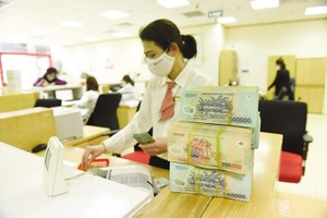 Các ngân hàng thương mại còn nhiều băn khoăn về đối tượng triển khai gói hỗ trợ lãi suất 2%