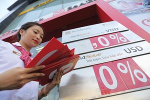 Diễn biến lãi suất hiện nay không còn có lợi cho các ngân hàng. Ảnh: Dũng Minh