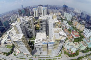 Nhà chung cư đang hút tiền. Ảnh: Dũng Minh