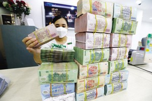 Tăng lãi suất, song nguồn vốn ngân hàng vẫn khá hạn chế. Ảnh: Đức Thanh