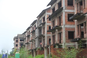 Dự án nhà ở rất khó phát triển nếu buộc phải có nguồn gốc đất ở. Ảnh: Dũng Minh